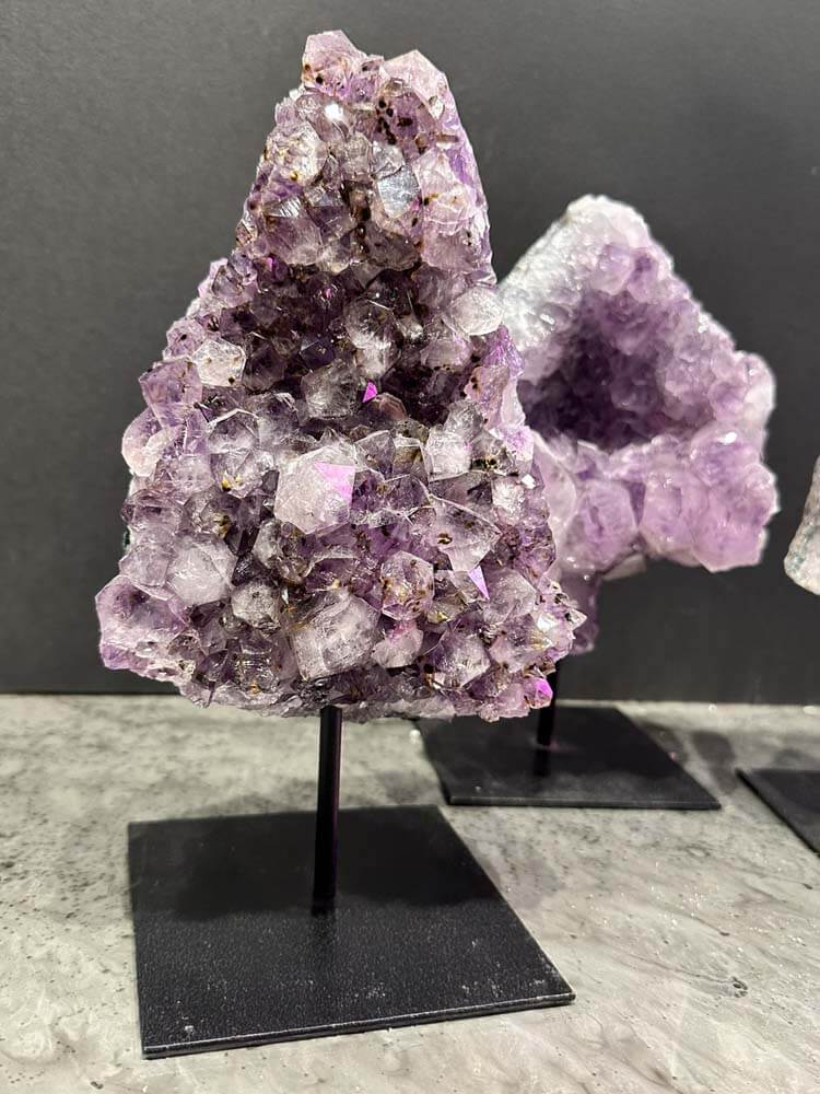 Brazilian Amethyst clusters from The Dutch Hospital Natural Curiosity, showcasing vibrant purple hues and unique natural formations perfect for decor or collection.