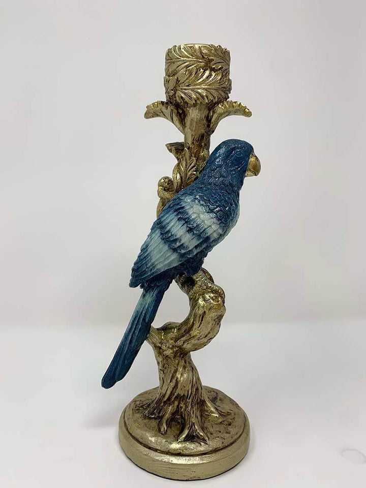 European-designed candle holders featuring a bluebird chinoiserie 