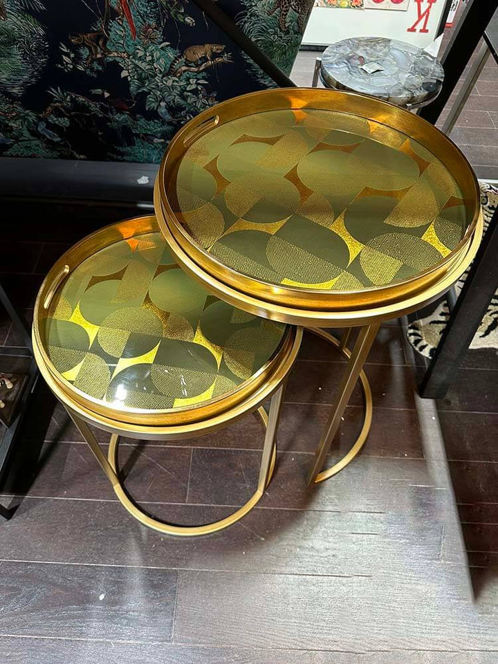 A set of two side tray tables featuring an Art Deco pattern, gold and green patterned side table tray
