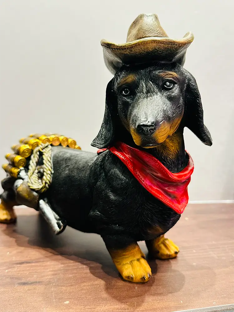 Dachshund dog figurine wearing a detailed Army Major General uniform with gold medals and epaulettes
