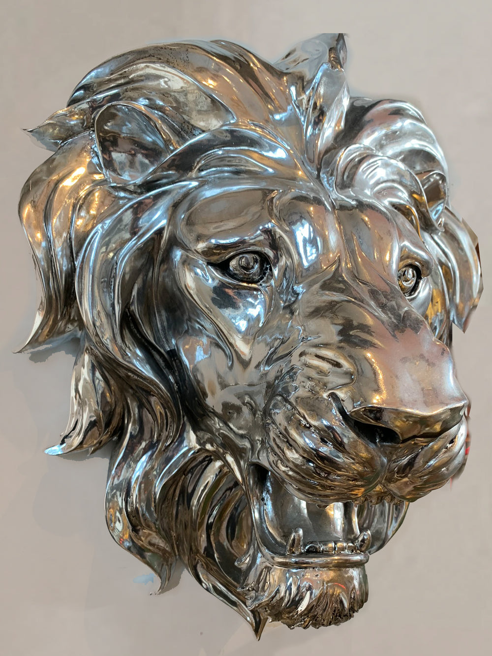 Beautiful carved antique silver lion wall head