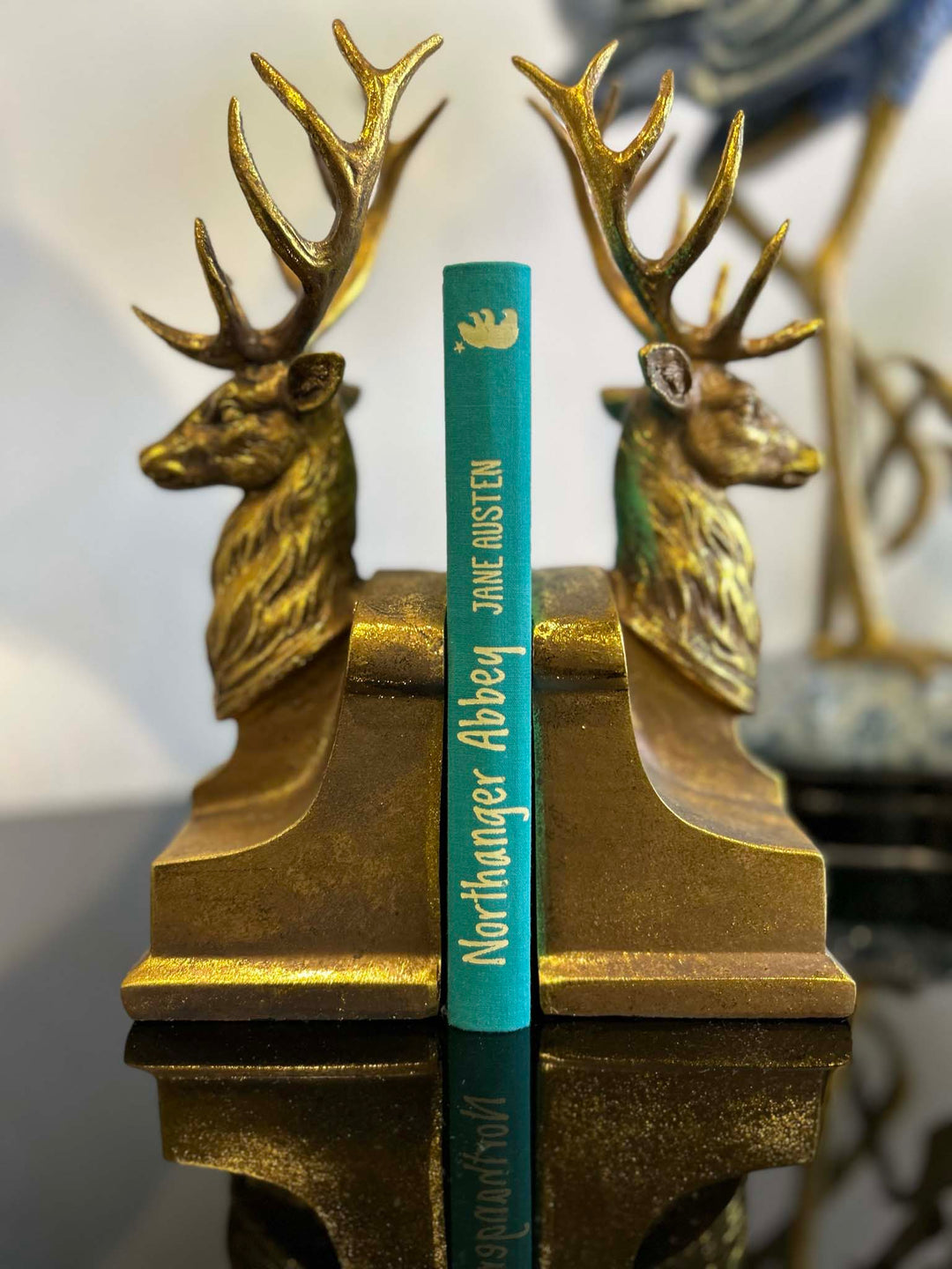 Antique gold stag bookend