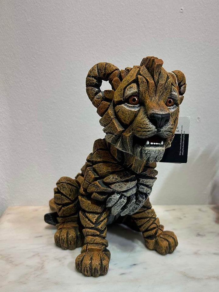 baby lion statue