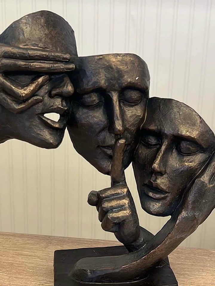 three faces, bronze faces, female abstract sculpture 