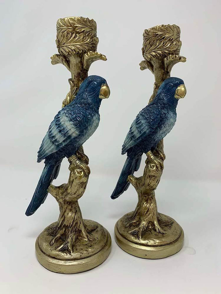 European-designed candle holders featuring a bluebird chinoiserie style