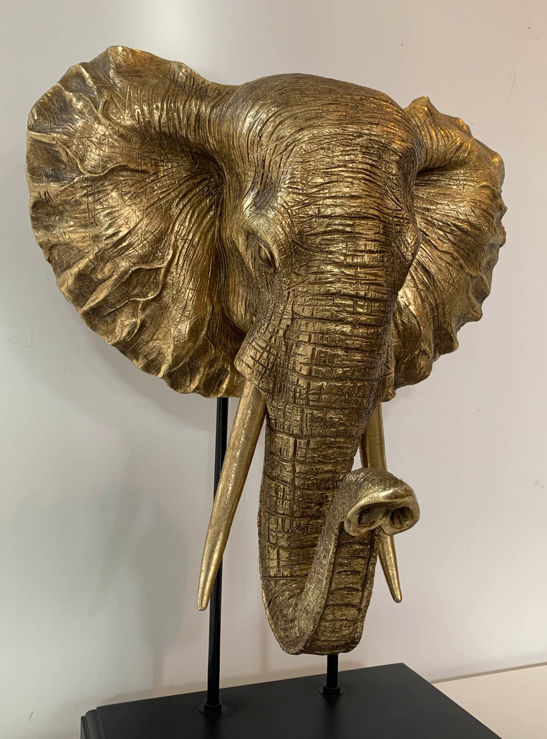 Large gold elephant head mounted sculpture 