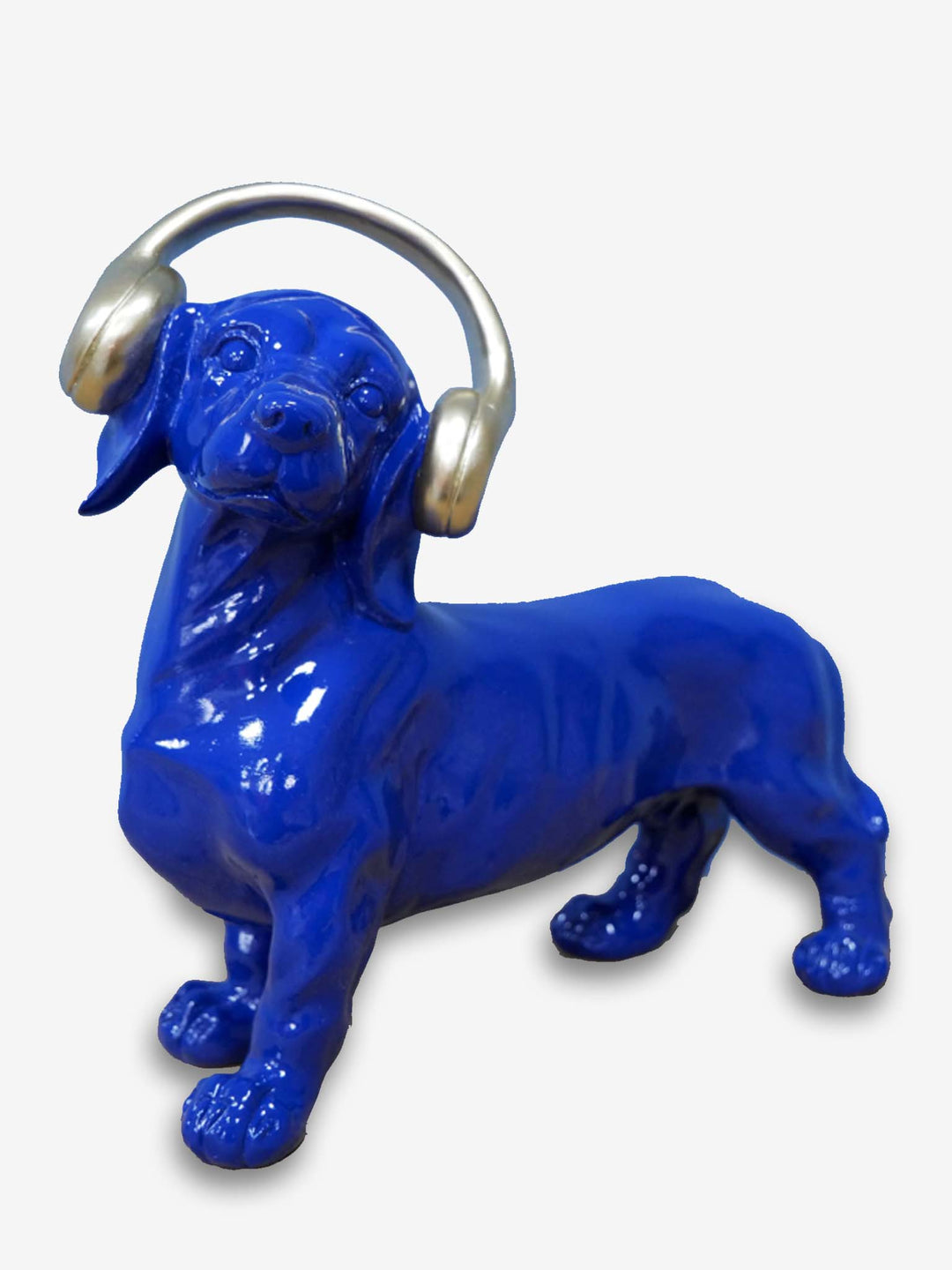Eclectic blue sausage dog with head phones on 