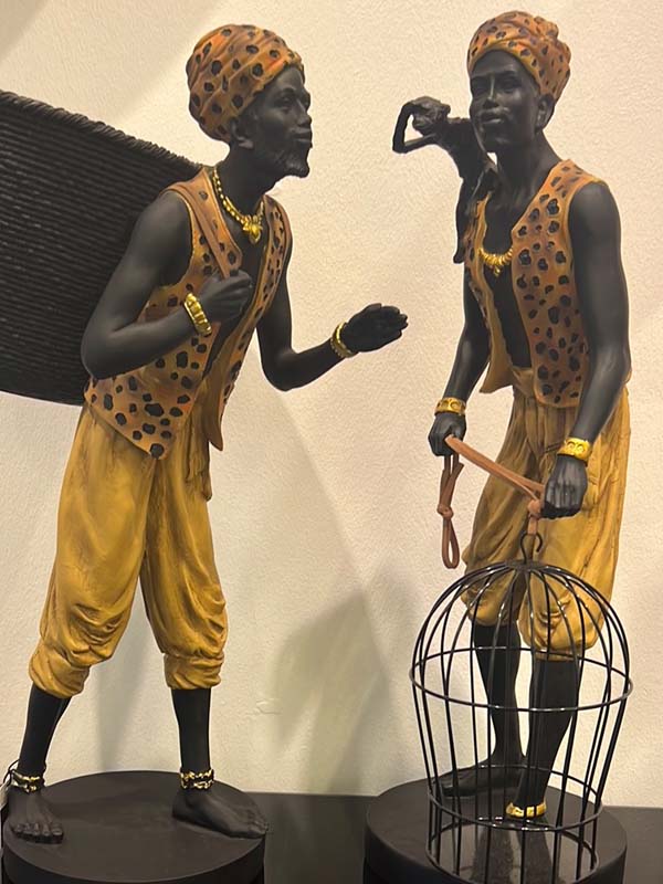 African Indian Turban Man with Monkey and Cage