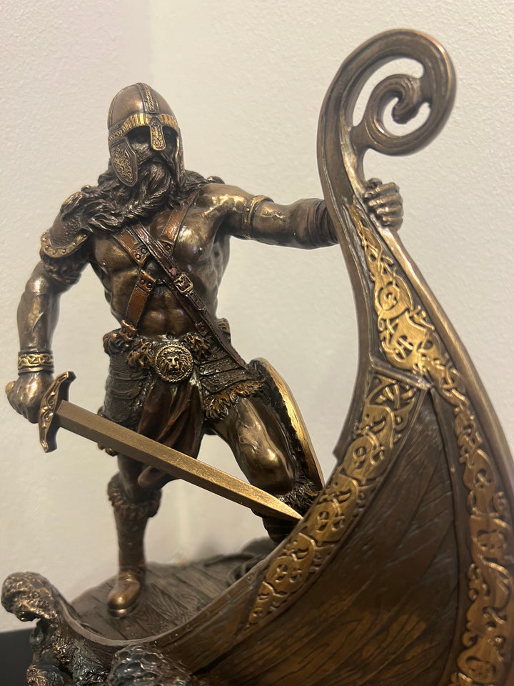 Viking warrior on long ship figurine